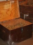 Wooden box decorated with artificial icicles and artificial snow spray imitating white frost.